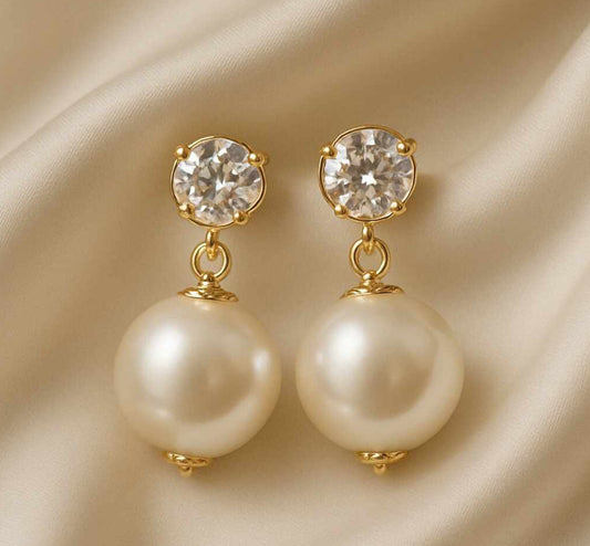 Brinco ponto luz com pérola